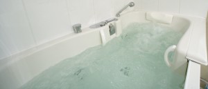 accessible hydrotherapy bathtub filled with water