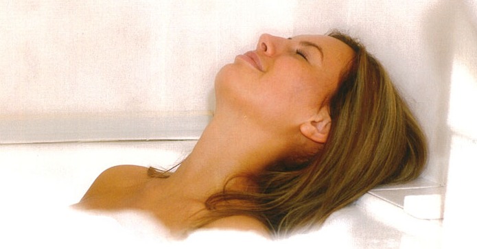 woman relaxing in bubble bath