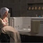 woman in wheelchair and ADL tub