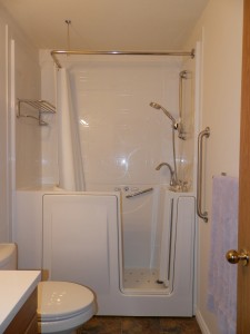 Right door Liberty with wall surround, deck extension, curtain and towel rack.